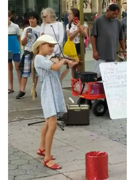 The Young Violinist at the Mall