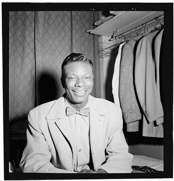 Nat King Cole sings “When I Fall in Love”